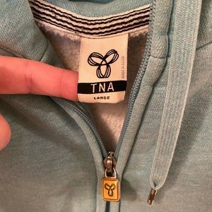 WOMENS TNA LARGE TEAL ZIP HOODIE